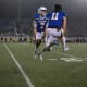 SDSU's quarterback Chase Mason and quarterback Mark Gronowski (11) celebrate the win against UAlbany on Friday, Dec. 15, 2023 at Dana J. Dykhouse in Brookings.